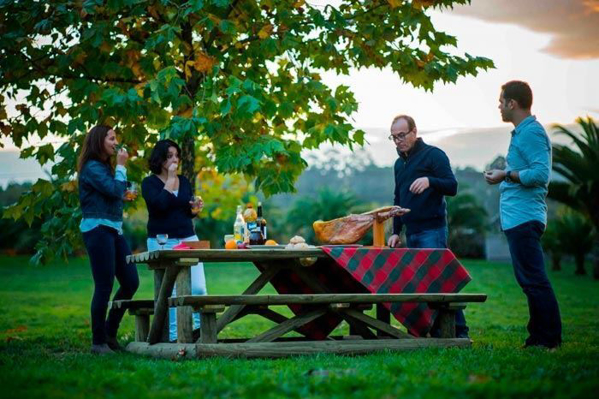 Picture of Garden table with benches in 1/2 wooden trunks