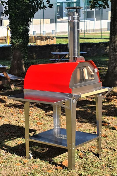 Picture of red Brasa pizza oven with trolley stand