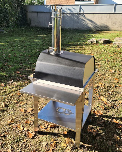 Picture of black Brasa pizza oven with trolley stand