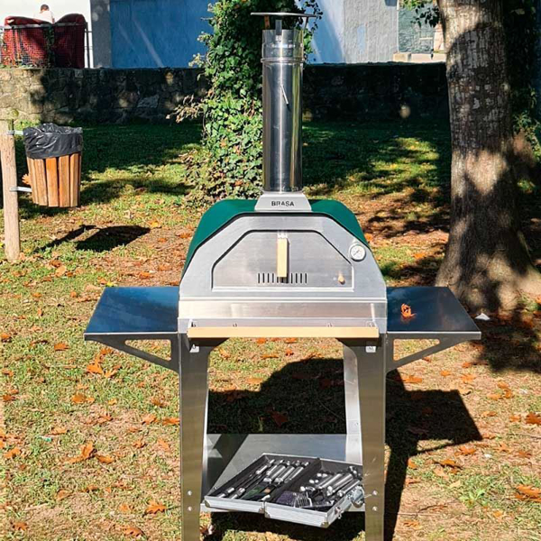 Picture of green Brasa pizza oven with trolley stand